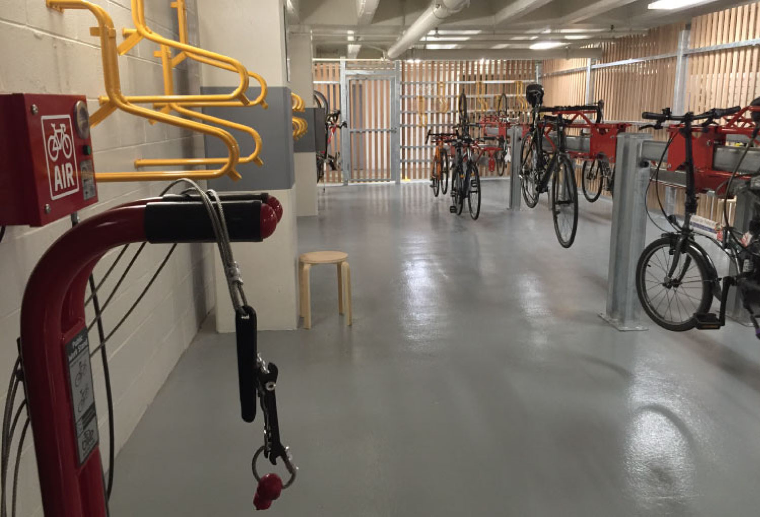 Secure bike storage with repair station