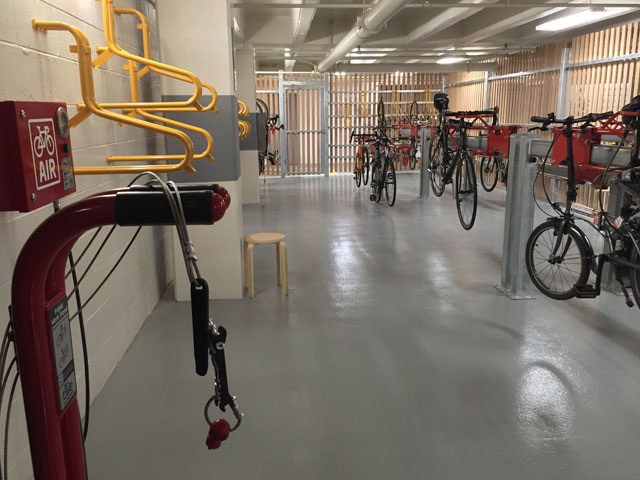 Secure bike storage with repair station